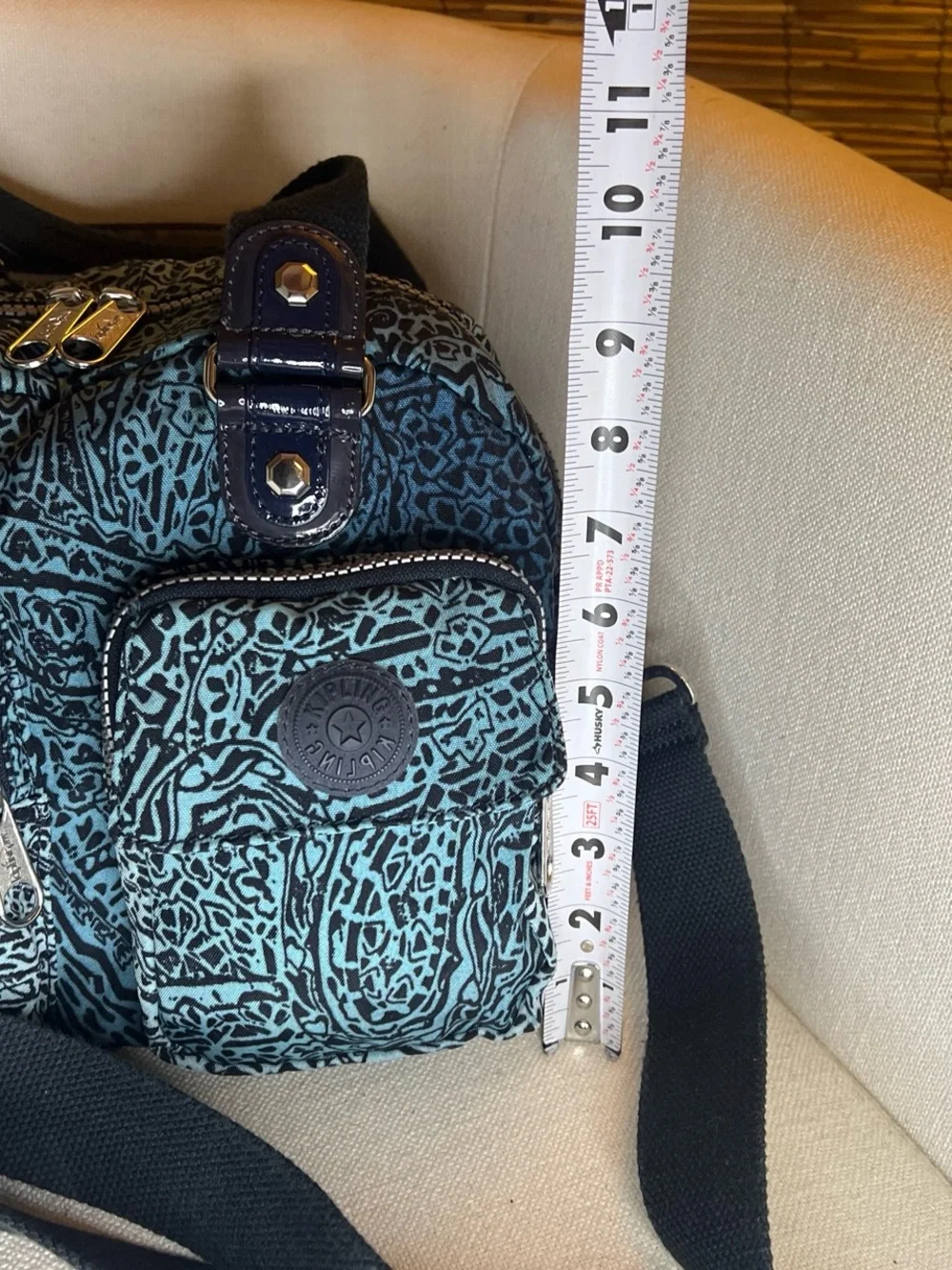 Teal and Black Patterned Shoulder Bag with Multiple Pockets